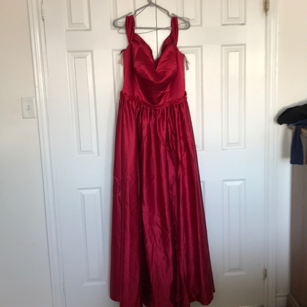 Long red satin ball gown.